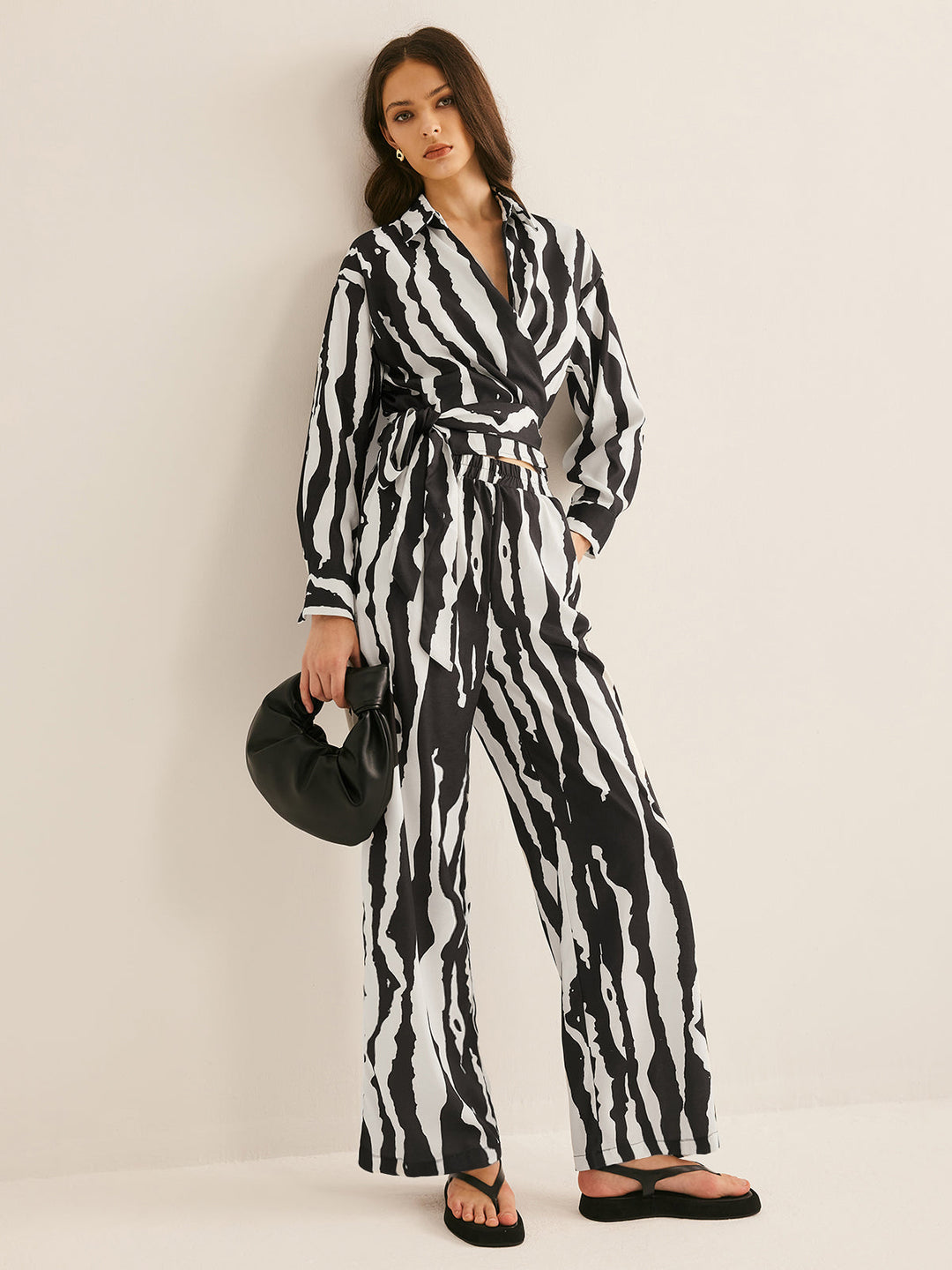 Svelte Chic V-Neck Zebra Printed Pants Set