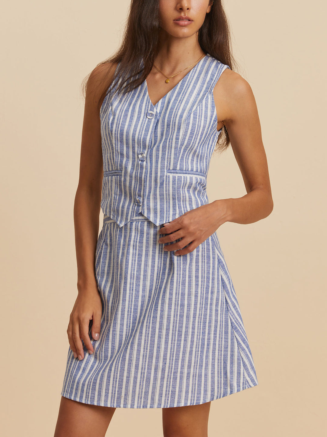 Çizgili kolsuz etek takımı, zarif ve şık tasarım