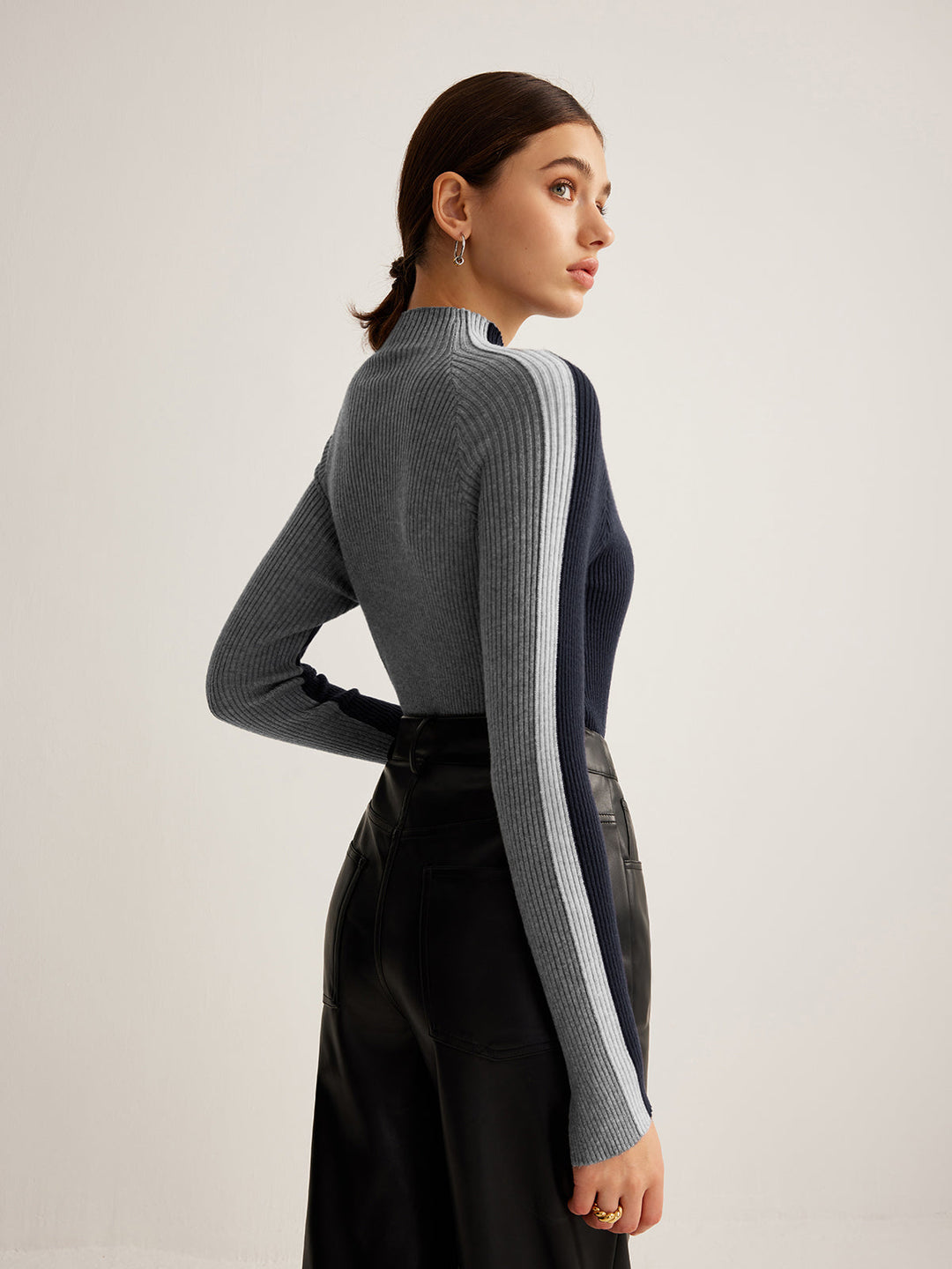 Yüksek yaka renk bloklu triko üst, Svelte Chic tasarımı