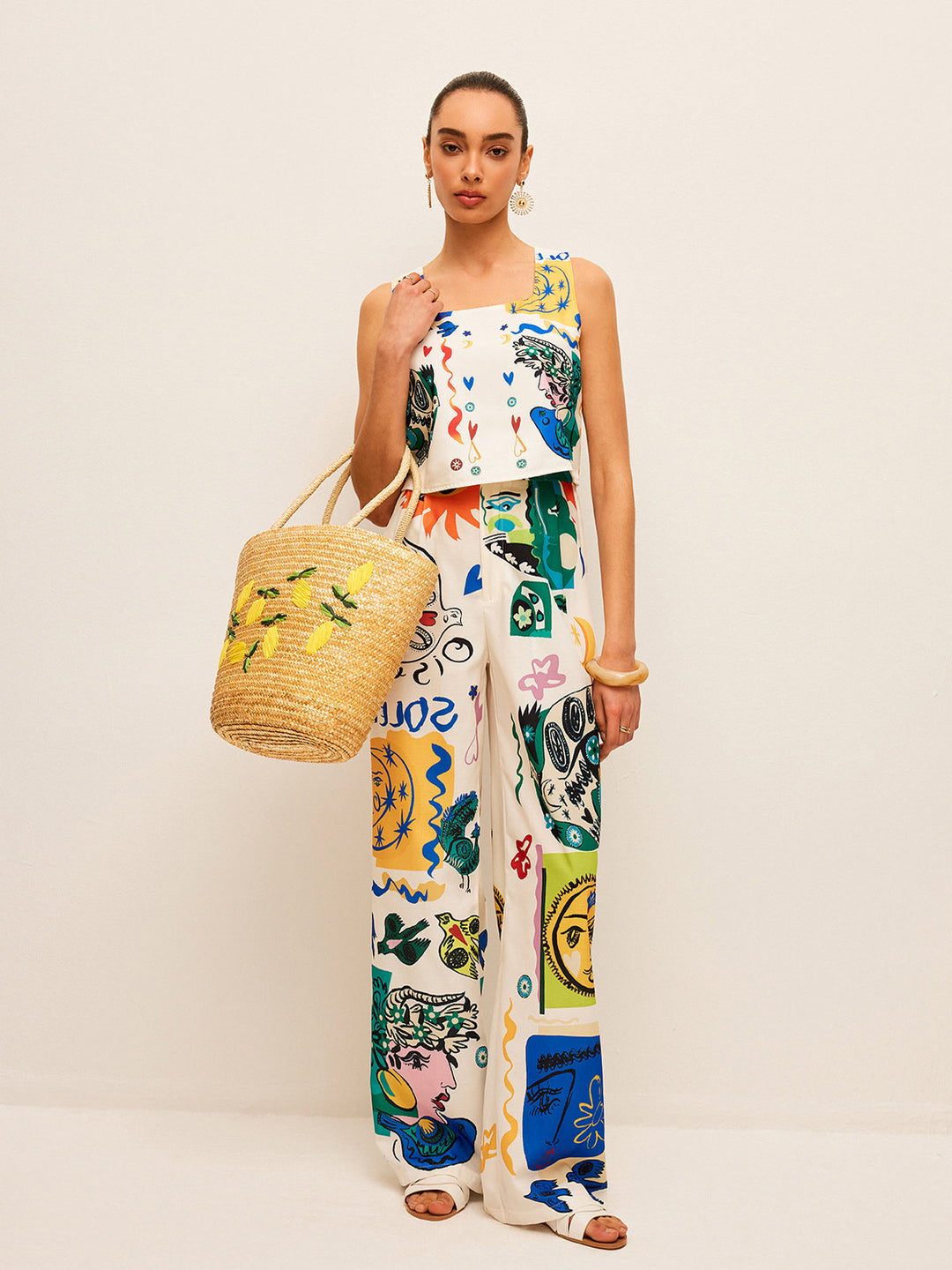 Şık Grafik Kısa Üst ve Zarif Geniş Paça Pantolon Takımı