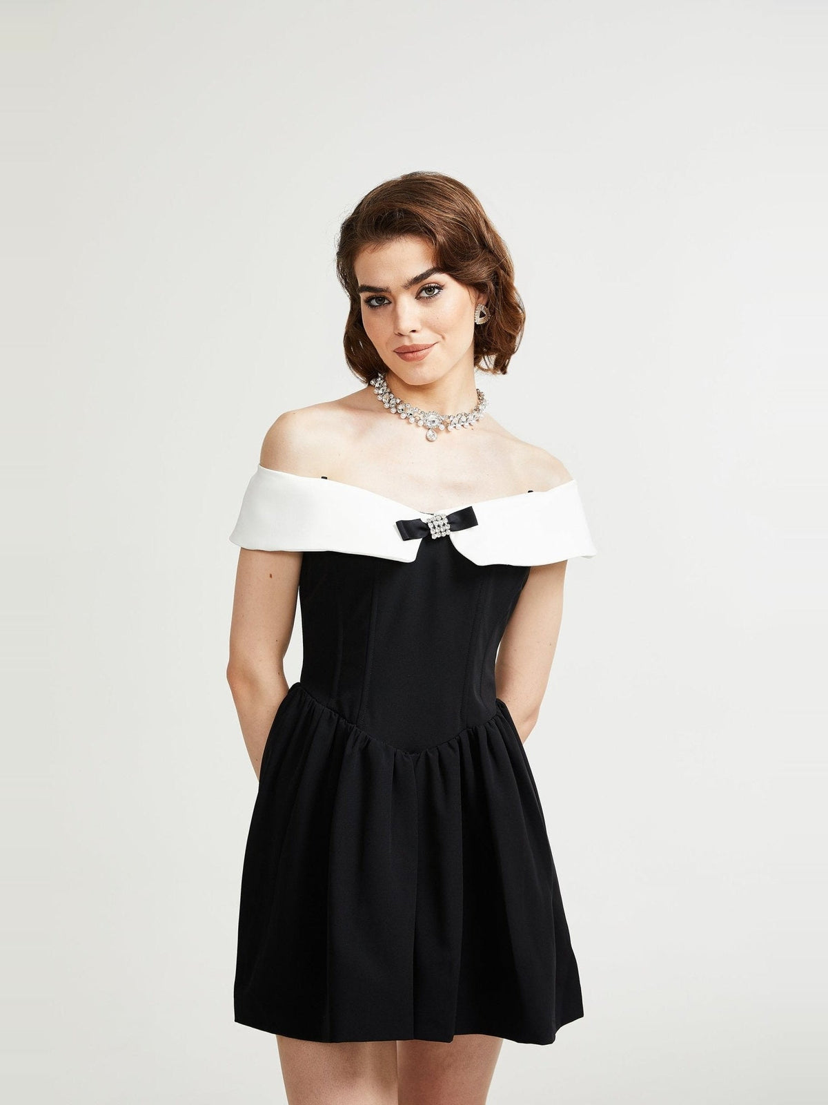 Deniece Off-Shoulder Bow-Detail Mini Dress in Black — Svelte Chic