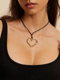 Openwork Heart Necklace — Gold Titanium Steel in Gold — Svelte Chic