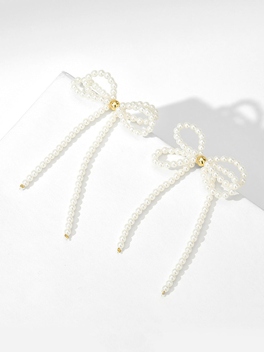 Bow Pearl Tassel Earrings — White & Gold — Svelte Chic