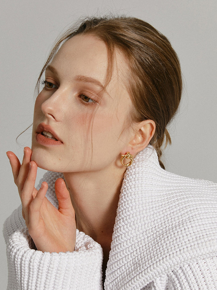 Златни обеци с възли 