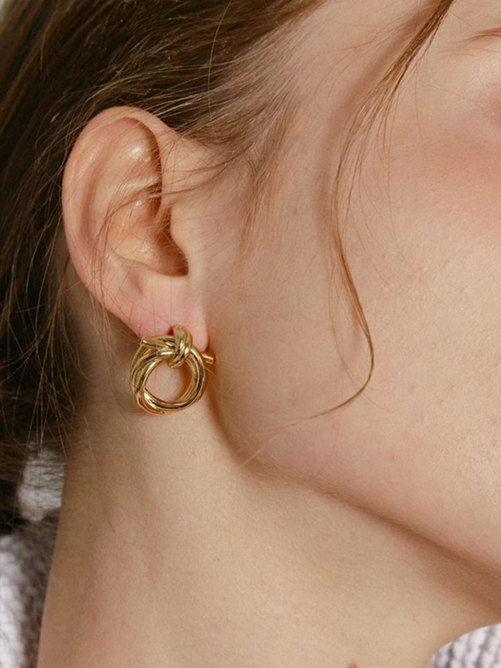 Златни обеци с възли 