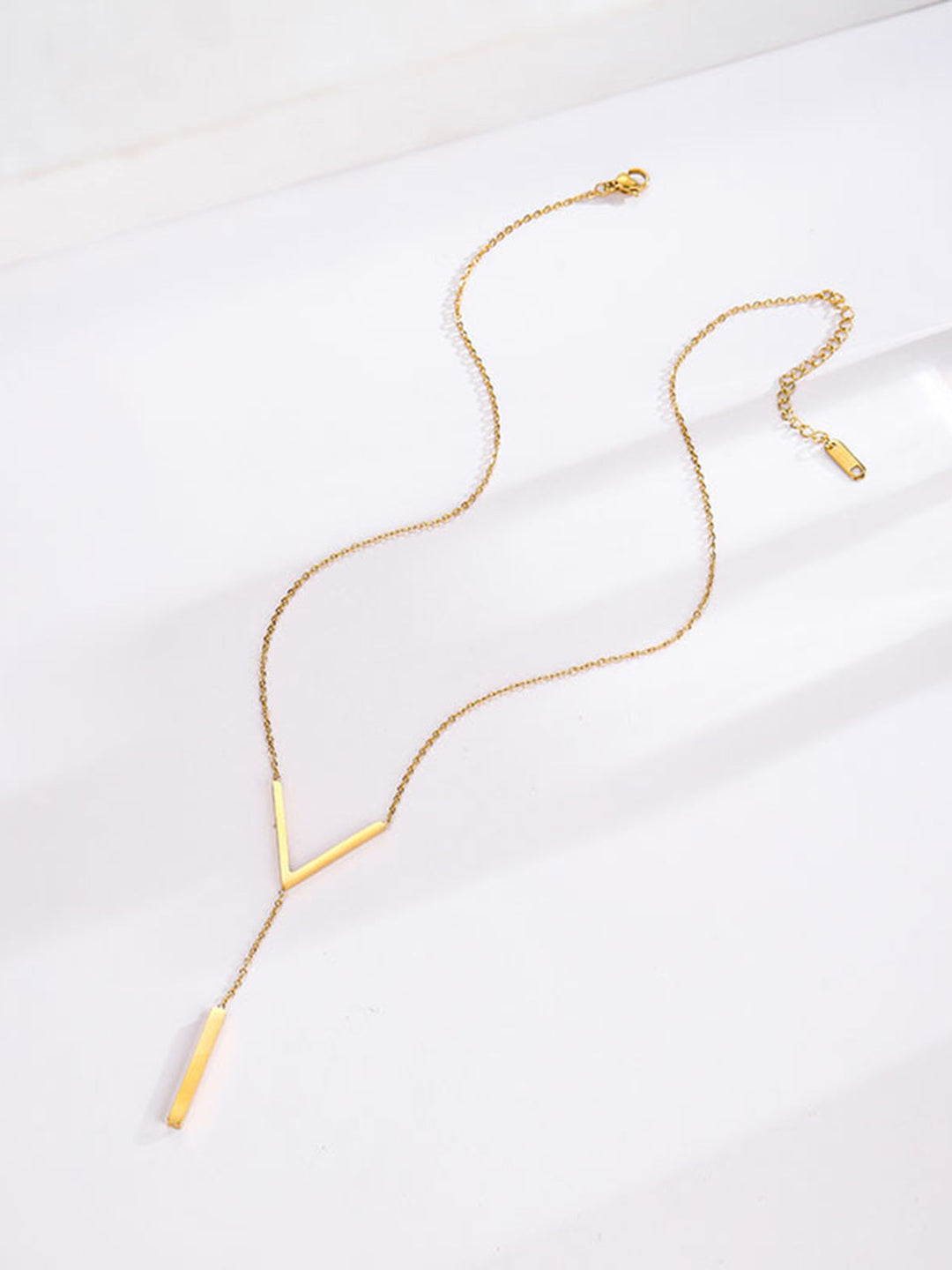 Геометрично колие с верижка от махало 