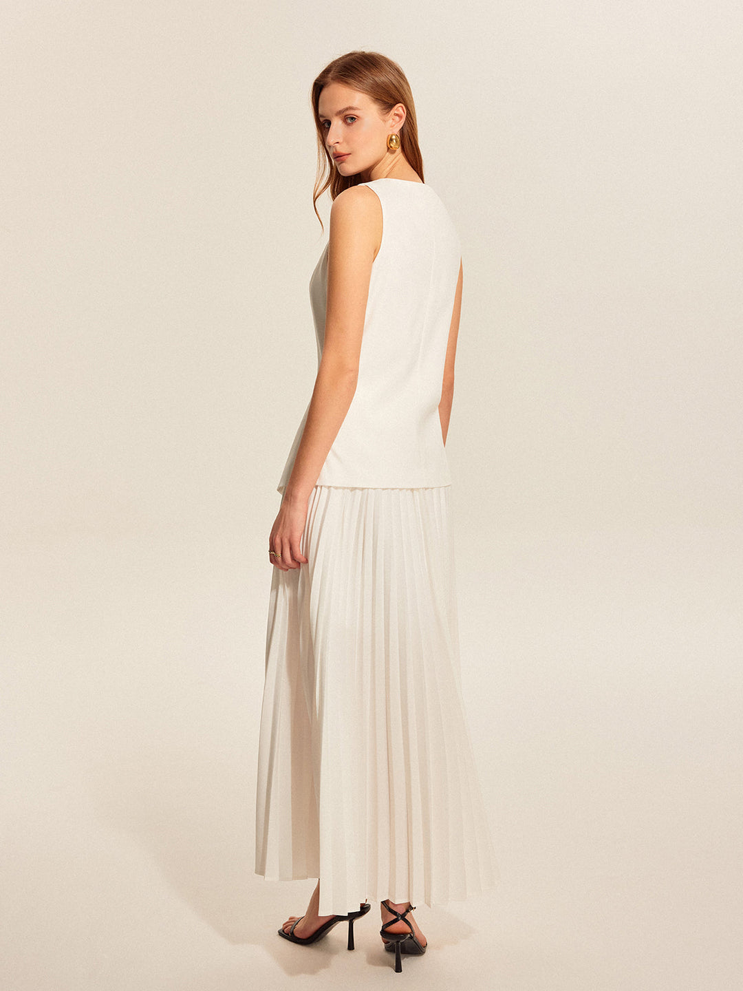 Şık Düğümlü Yelek ve Akışkan Pliseli Etek Takımı