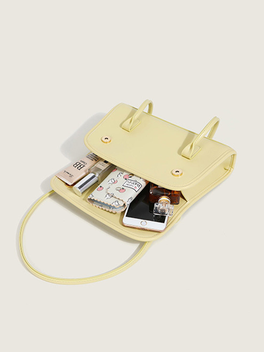 Şık ve modern tarz için detaylı düğmeli sade el çantası