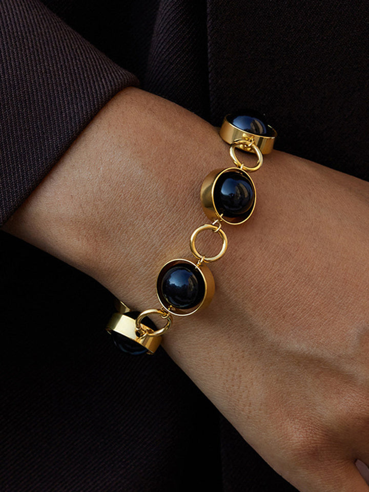 Döner Siyah Boncuklu Kilitli Bilezik