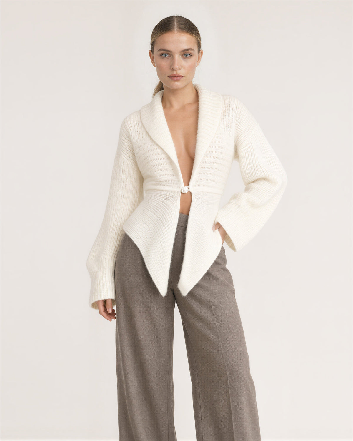 Liana Single Pearl Button Shawl Collar Cardigan, off white, front, hands on the waist