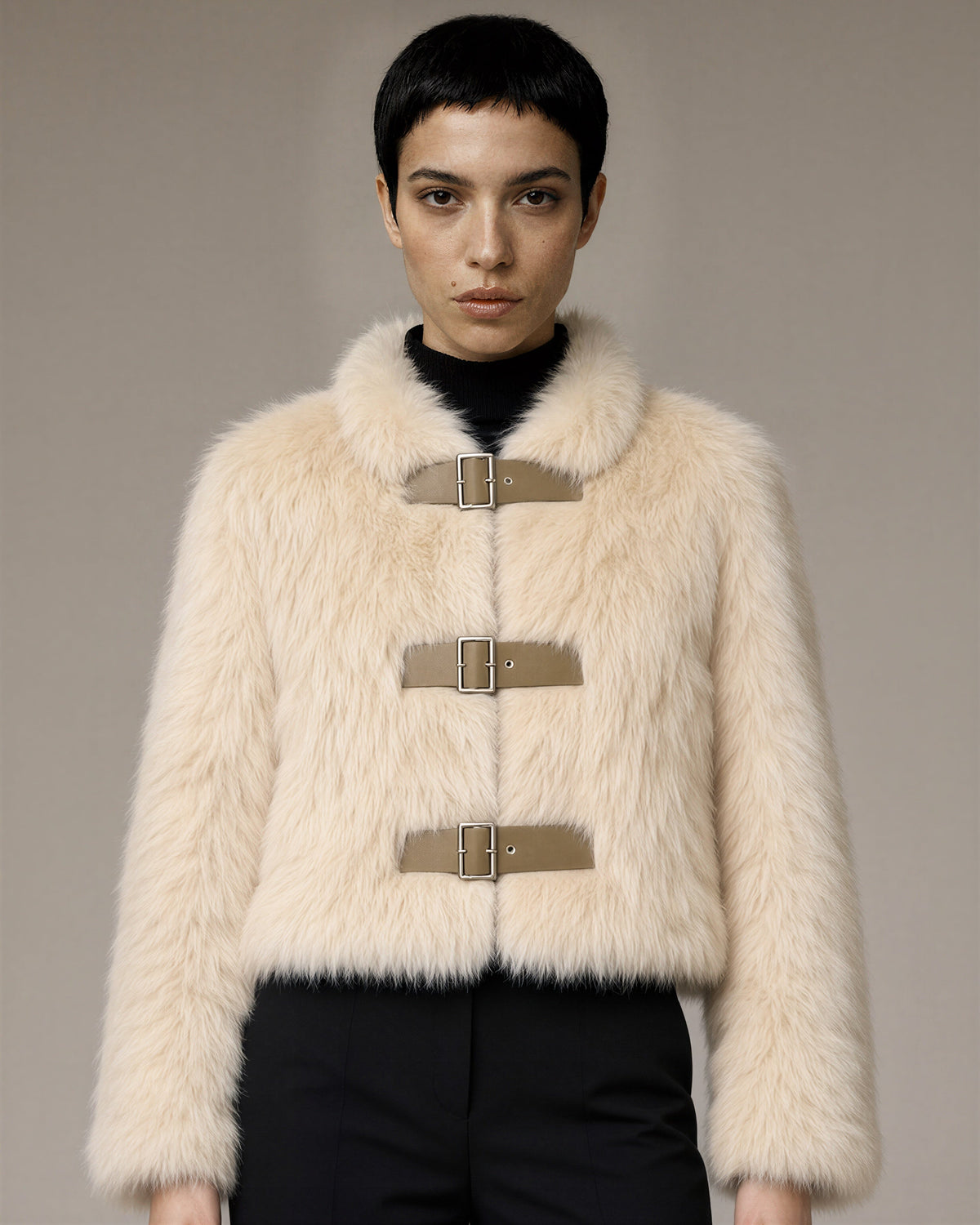 Nella Buckled Cropped Faux Fur Jacket, cream, close up above the waist